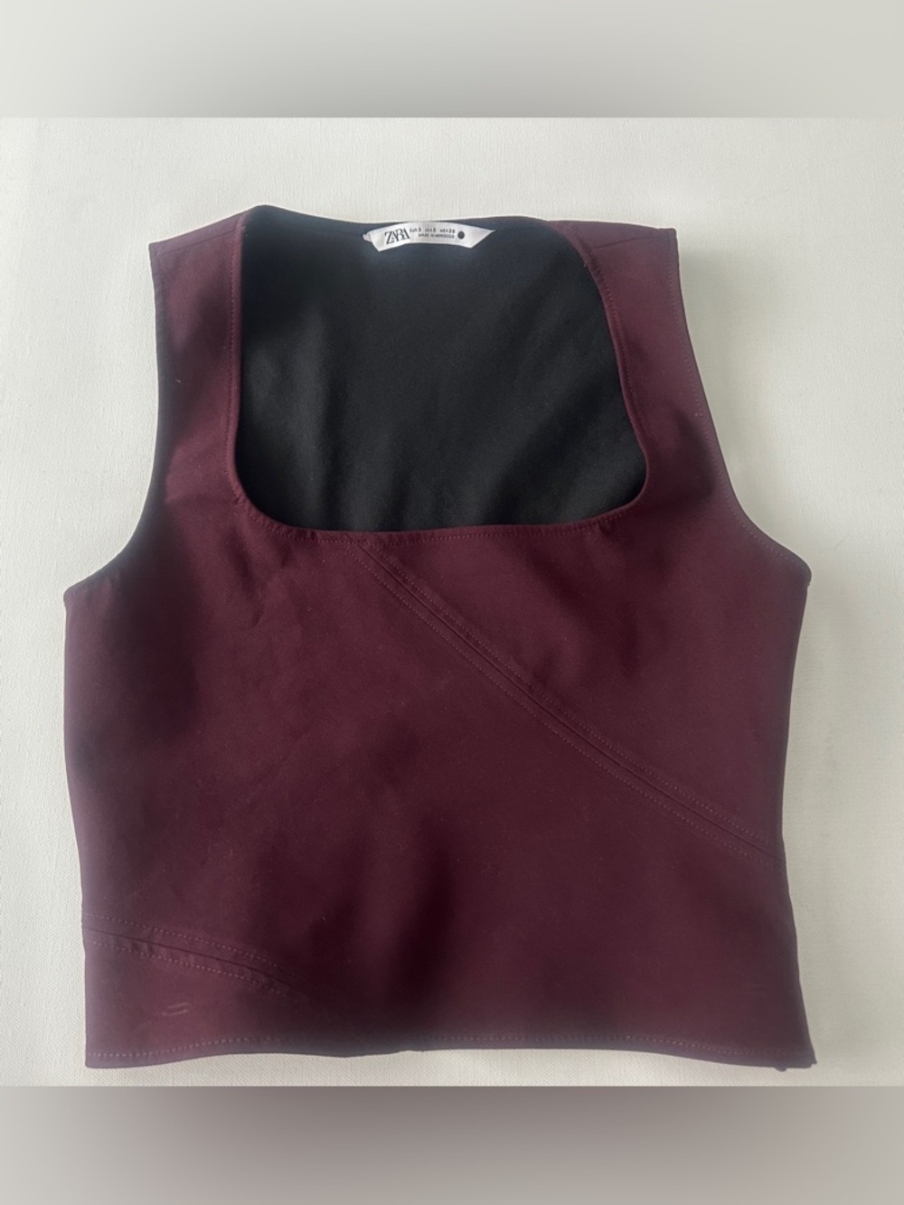 Zara women’s burgundy crop top with a square neckline.  Size S.